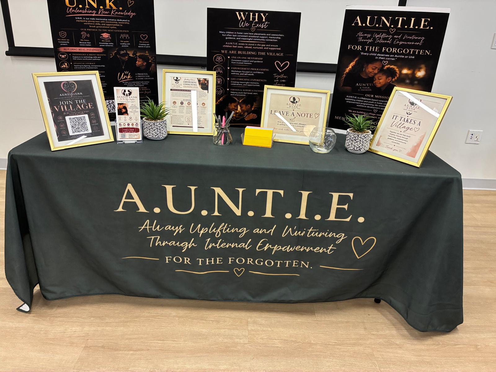 A.U.N.T.I.E. & U.N.K. community display and mission board